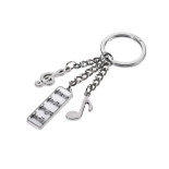 Brelok TROIKA 5 Sinfonie, 3 charmsy, metal